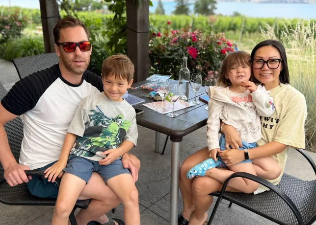 Rebecca and Delayne are pictured with their children, Sadie and Greyson, at Deep Roots Winery. Rebecca says the family-friendly winery feels "easy and welcoming," adding that parents never feel like they're imposing when visiting with young children.